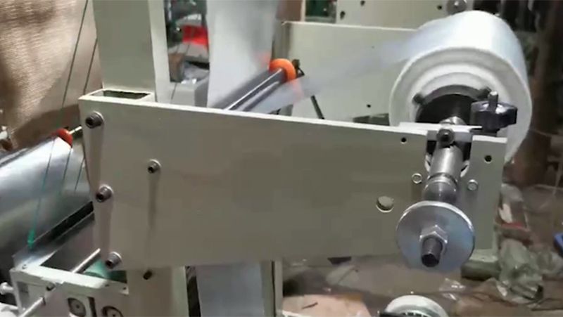 Computer Controlled Plastic Glove Making Machine