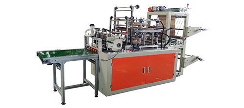 Computer Controlled Plastic Glove Making Machine