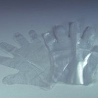 Computer Controlled Plastic Glove Making Machine